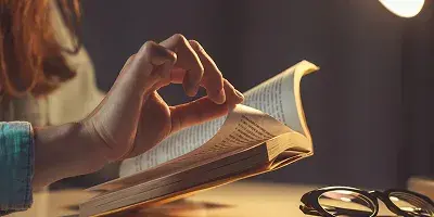 A writer brainstorming ideas with notes and coffee